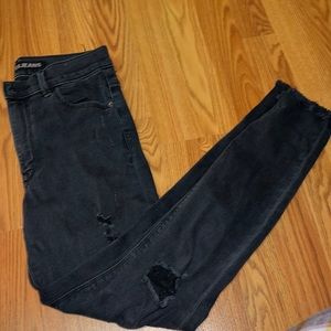 Black destroyed ankle jeans